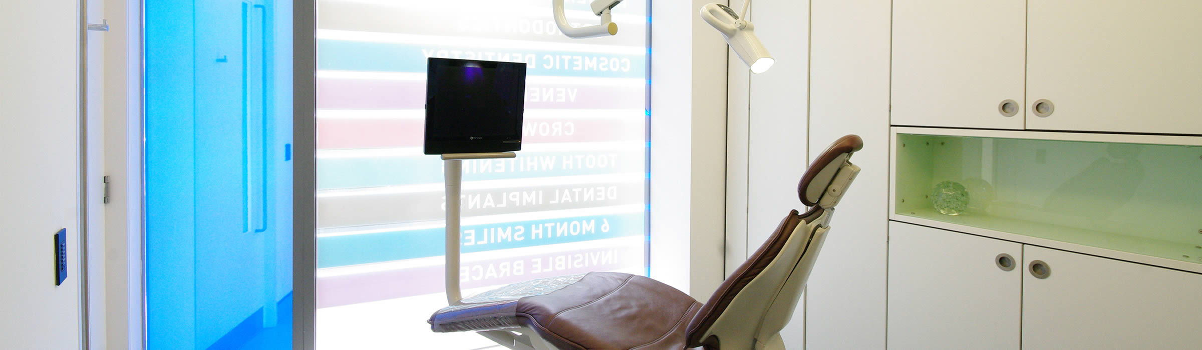 Dental chair with screen at our Watford dentist, Senova Dental Studios in Watford, Hertfordshire